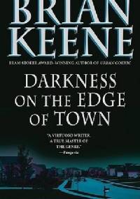 Darkness at the edge of the town - Brian Keene